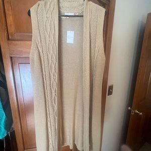 Long sleeveless sweater vest